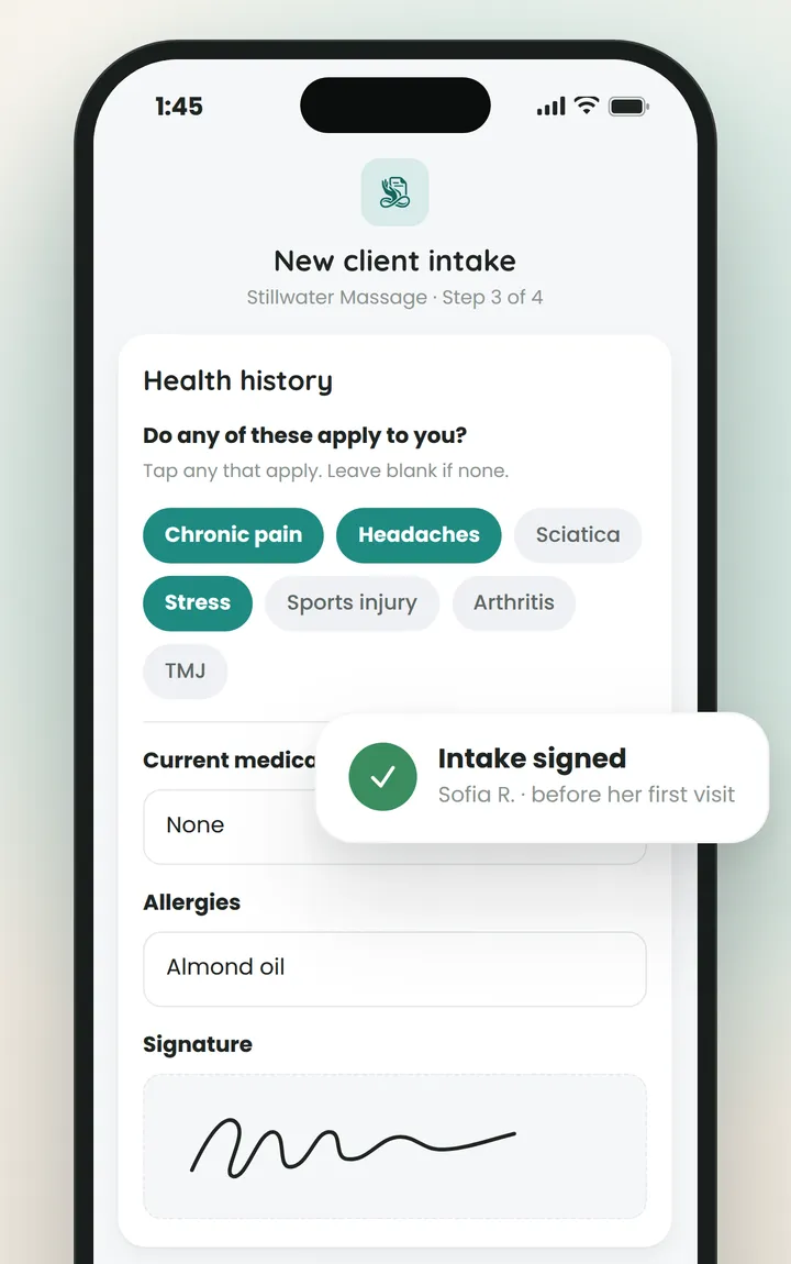 A client intake form with health history and a signature, marked as signed.